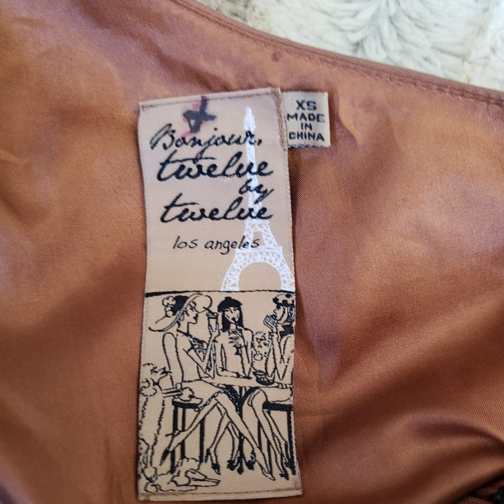 TWELVE BY TWELVE RUST/COPPER ONE SLEEVE DRESS.‎ - Picture 7 of 7